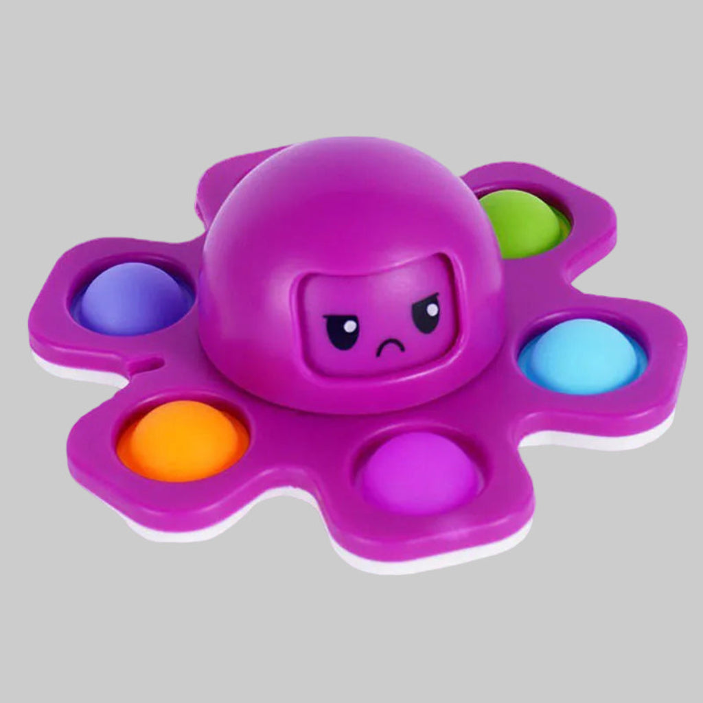 Purple octopus-shaped pop-it toy with colorful dots on a white background